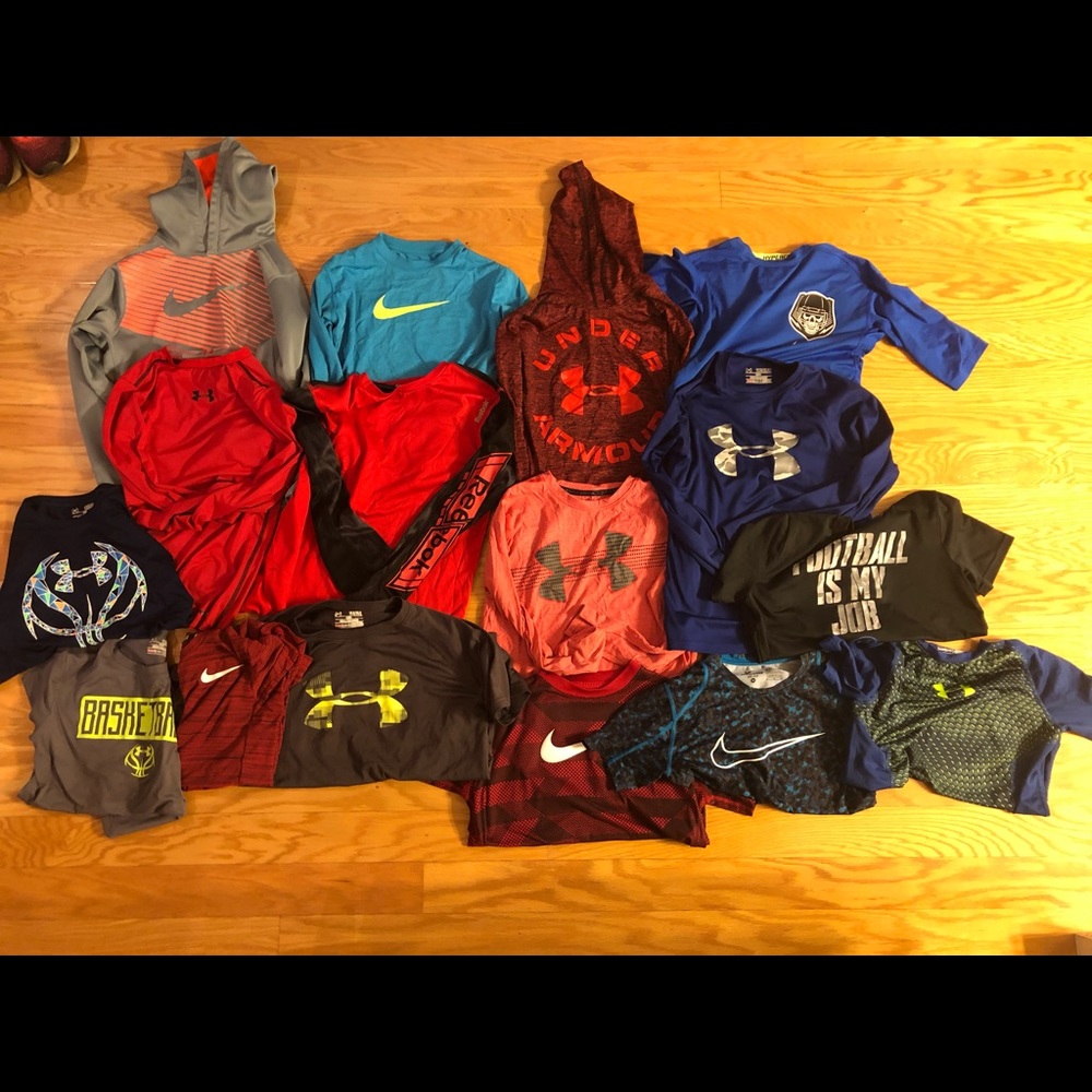Ua and Nike shirts. YM. 8 long and 8 short sleeve